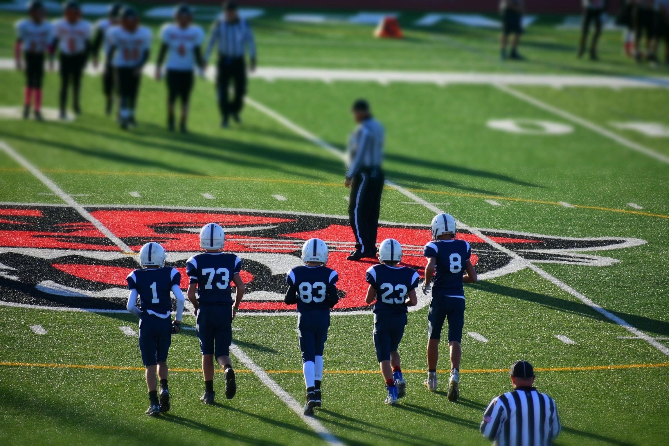 Sailor Youth Football game at midfield