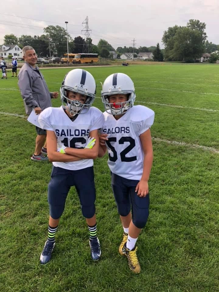 Two Sailors players on the field